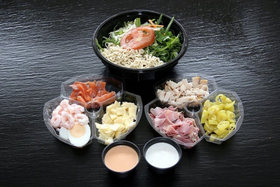 Salad selection with ingredients in little containers